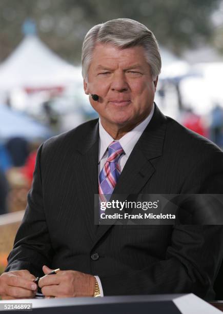 Sportscaster Jimmy Johnson speaks at the FOX Broadcast booth during the XXXIX Superbowl pregame show at Alltel Stadium on February 6, 2005 in...