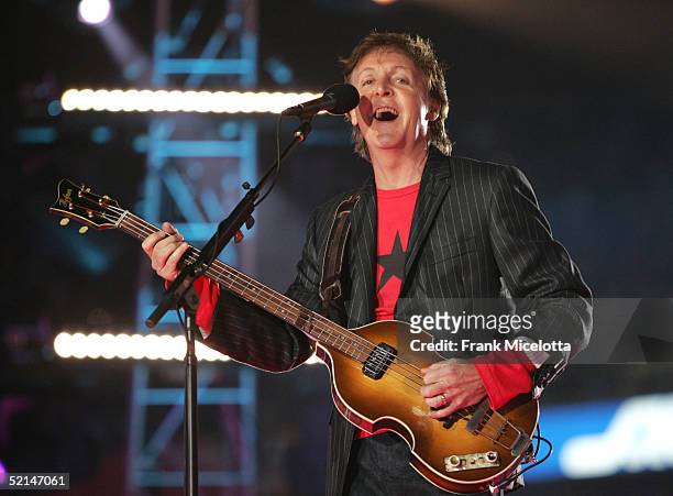 Musician Paul McCartney performs on stage during the XXXIX Superbowl Half-Time show at Alltel Stadium on February 6, 2005 in Jacksonville, Florida.
