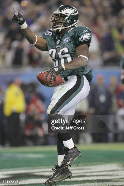 Running back Brian Westbrook of the Philadelphia Eagles celebrates after catching a 10-yard touchdown pass against the New England Patriots during...