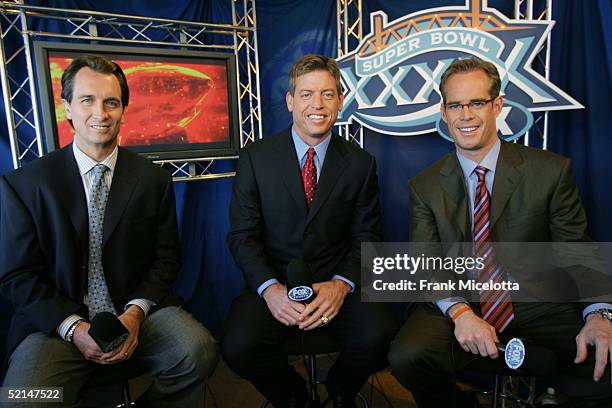 Game broadcasters Cris Collinsworth, Troy Aiken and Joe Buck during the XXXIX Superbowl pregame show at Alltel Stadium on February 6, 2005 in...