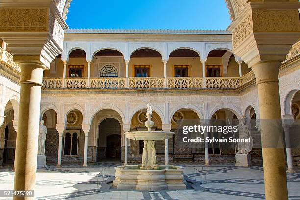 sevilla, patio in casa de pilatos - interior casa stock pictures, royalty-free photos & images