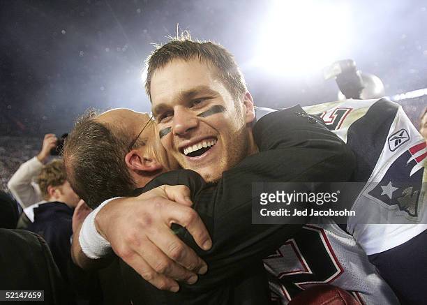 Quarterback Tom Brady of the New England Patriots celebrates with team vice president Jonathan Kraft after defeating the Philadelphia Eagles in Super...