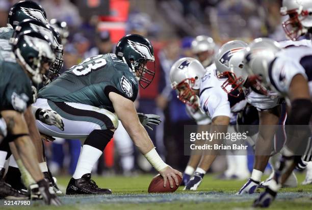 Hank Fraley of the Philadelphia Eagles prepares to snap against the New England Patriots in the fourth quarter of Super Bowl XXXIX at Alltel Stadium...