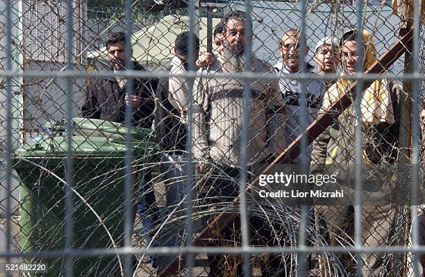 Palestinian prisoners, convicted of security offenses against Israel, are seen at the courtyard in Megido jail, northern Israel February 15, 2005....