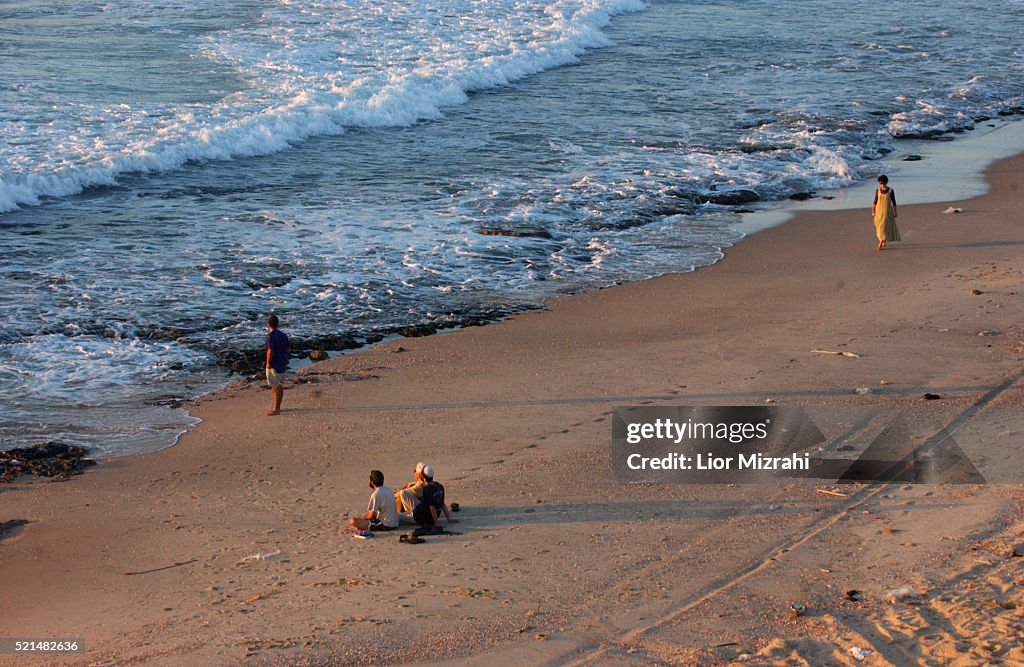 Kitif Israelis are seen on the beach of the Gush Katif Settlement Block ...