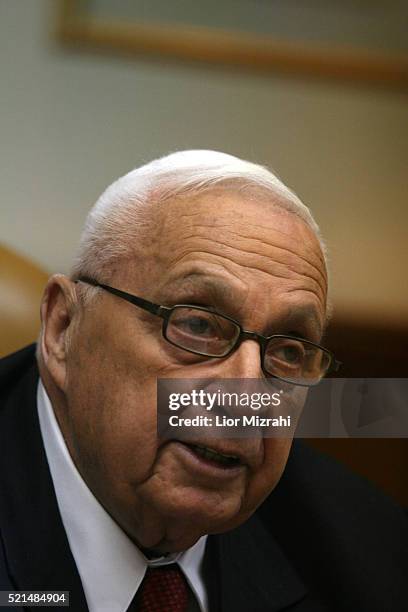 Israeli Prime Minister Ariel Sharon speaks at the beginning of the weekly cabinet meeting at his Jerusalem office Sunday, January 01, 2006.