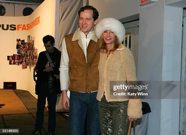 Writer Candice Bushnell and her Husband pose for photos in the lobby of the main tent during Olympus Fashion Week Fall 2005 at Bryant Park February...