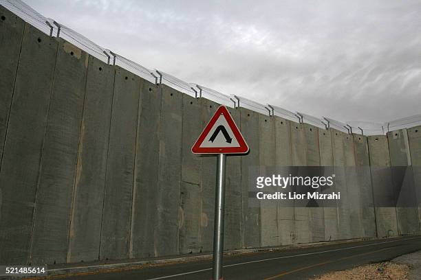 The separation wall at the West Bank village of Abu Dis Saturday, February 25, 2006.
