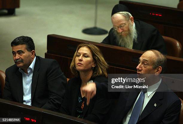 Israeli Prime Minister Ehud Olmert Foreign Minister Tzipi Livni and Defence Minister Amir Peretz during a budget vote in the Knesset, Israel's...