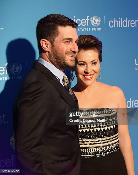 Dave Bugliari and Ambassador and recipient of the 'Spirit of Compassion' award Alyssa Milano at the Children First. An Evening With UNICEF on April...