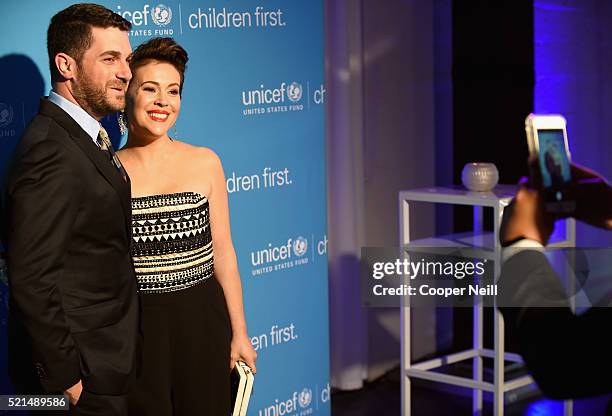 Dave Bugliari and Ambassador and recipient of the 'Spirit of Compassion' award Alyssa Milano pose for a selfie at the Children First. An Evening With...
