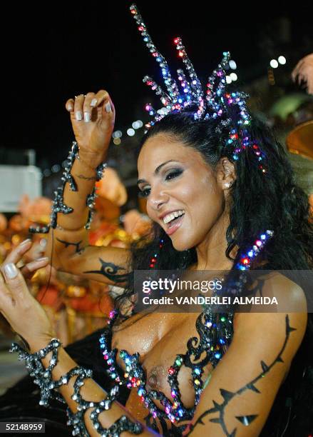 Fabia Borges, Queen of the Drums of samba school Unidos da Tijuca, performs 07 February in Rio de Janeiro's Sambodrome during the opening of the...