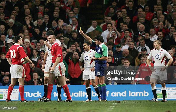 Danny Grewcock of England is shown the yellow card by referee Steve Walsh during the RBS Six Nations International between Wales and England at The...