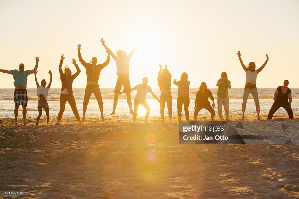Bootcamp people performing sports at the beach of St.Peter-Ording,Germany