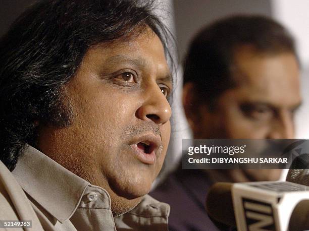 Indian film producer Ramkumar addresses a press conference as the Chief Operating Officer of Tata Teleservices, Tamil Nadu state, M. Madhusudan looks...