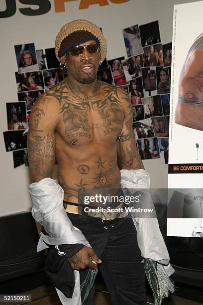 Former Basketball Player Dennis Rodman Unveils New Peta Ad during Fashion Week at Bryant Park on Feburary 7, 2005 in New York City.