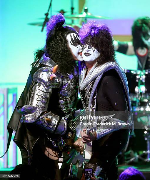 Musicians Gene Simmons and Tommy Thayer of KISS perform onstage during the 23rd Annual Race To Erase MS Gala at The Beverly Hilton Hotel on April 15,...