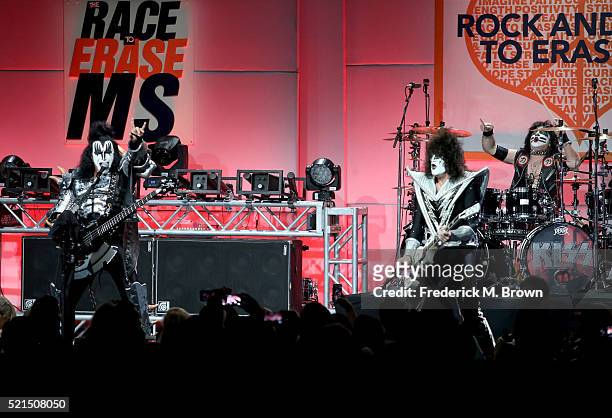 Musicians Gene Simmons, Tommy Thayer and Eric Singer of KISS perform onstage during the 23rd Annual Race To Erase MS Gala at The Beverly Hilton Hotel...