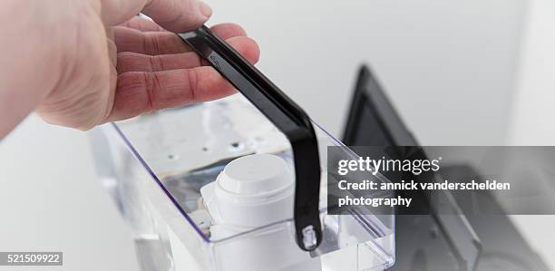 filled water tank in espresso machine. - descaling agent stock pictures, royalty-free photos & images