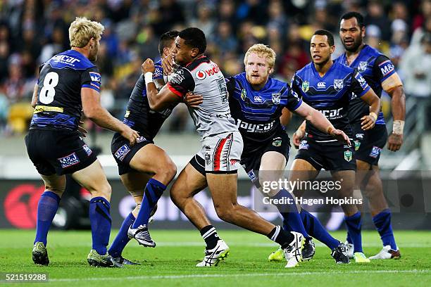 David Fusitu'a of the Warriors is tackled by James Graham of the Bulldogs during the round seven NRL match between the Canterbury Bulldogs and the...