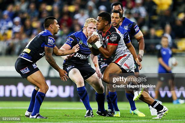 David Fusitu'a of the Warriors runs at Michael Lichaa of the Bulldogs during the round seven NRL match between the Canterbury Bulldogs and the New...