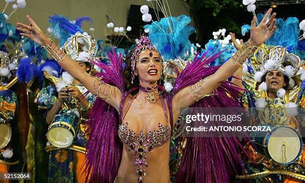 Luma de Oliveira, Queen of the Drums of Caprichosos de Pilares samba school performs ahead of the band 07 February on the second evening of the...