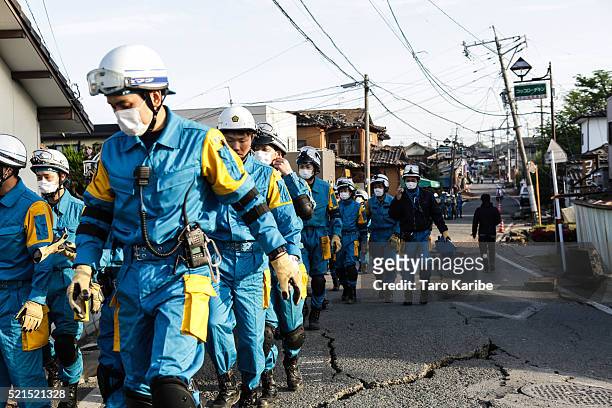 Rescue team head for the house people are buried alive on April 16, 2016 in Kumamoto, Japan. A 7.3 magnitude earthquake hit Kumamoto prefecture once...