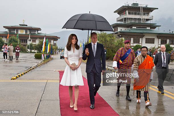 Prince William, Duke of Cambridge and Catherine, Duchess of Cambridge bid farewell at Paro Airport before boarding their flight to Agra for their...