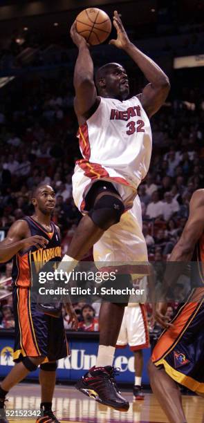 Shaquille O'Neal of the Miami Heat shoots against the Golden State Warriors on February 7, 2005 at the American Airlines Arena in Miami, Florida....