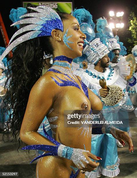Valeria Valensa, Queen of the Drums of Portela samba, school performs ahead of the percussion band at the Sambodrome, 08 February 2005, during the...