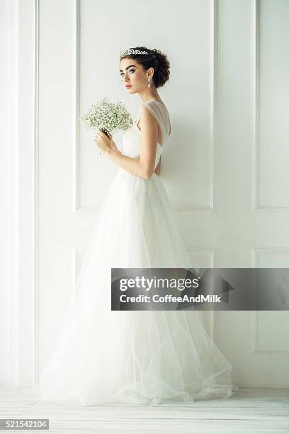 studio shot of young beautiful bride - wedding dress stock pictures, royalty-free photos & images