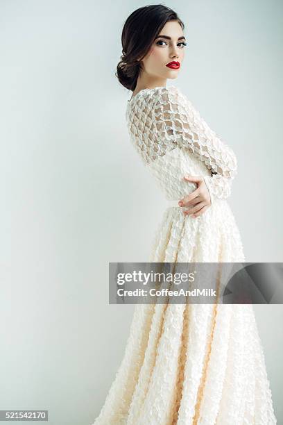 beautiful woman wearing cocktail dress - haute couture dress stock pictures, royalty-free photos & images