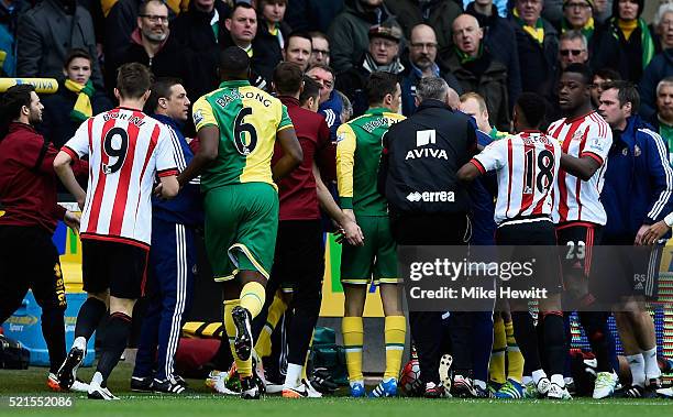 Norwich and Sunderland players confront one another including manager Sam Allardyce of Sunderland after Robbie Brady's tackle on DeAndre Yedlin...