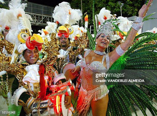 Actress Susana Vieira, Queen of the Drums of Grande Rio samba school, performs ahead of the percussion band at the Sambodrome 08 February 2005,...