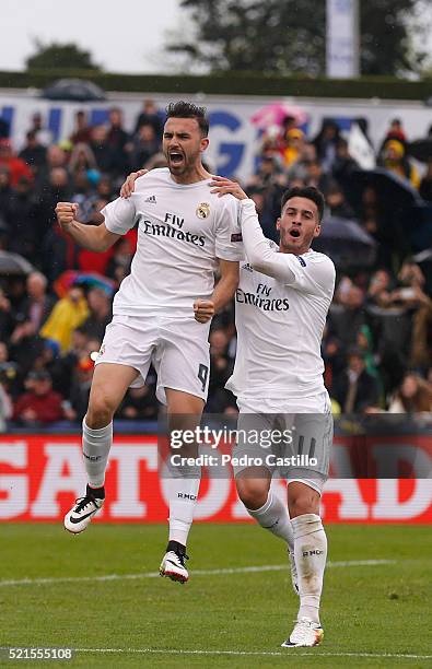 Borja Mayoral of Real Madrid celebrates after scoring with his team-mate Jose Carlos Lazo during the UEFA Youth League semi final match between Real...