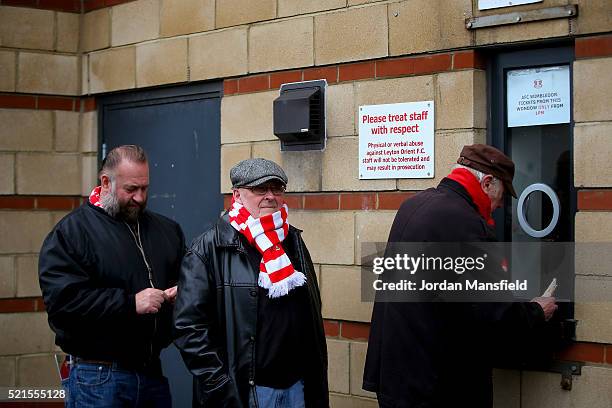 Fans queue at a ticket booth ahead of the Sky Bet League Two match between Leyton Orient and Dagenham & Redbridge at Brisbane Road on April 16, 2016...