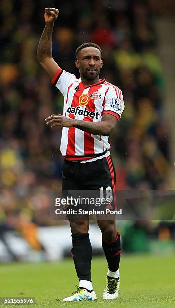 Jermain Defoe of Sunderland celebrates scoring his team's second goal during the Barclays Premier League match between Norwich City and Sunderland at...