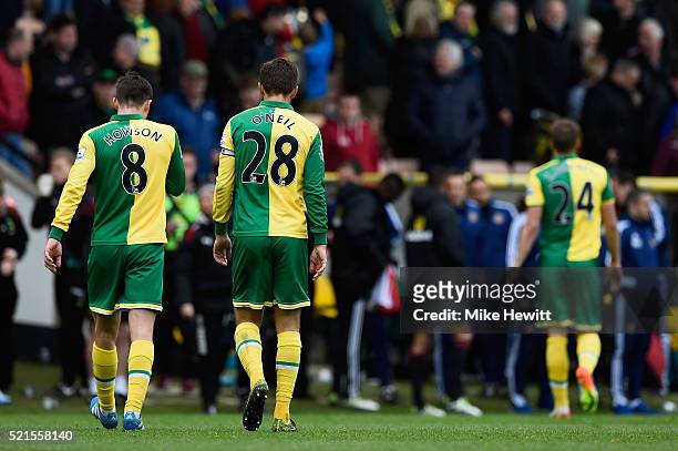 Jonathan Howson and Gary O'Neil of Norwich City leave the field after the Barclays Premier League match between Norwich City and Sunderland at Carrow...