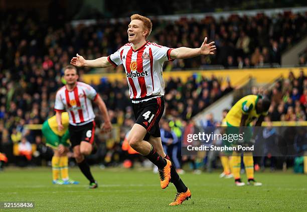 Duncan Watmore of Sunderland celebrates scoring his team's third goal during the Barclays Premier League match between Norwich City and Sunderland at...