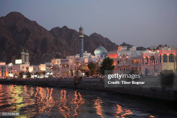 oman, muscat, mutrah, skyline at dusk - オマーン ストックフォトと画像