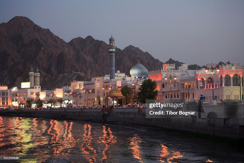 Oman, Muscat, Mutrah, skyline at dusk