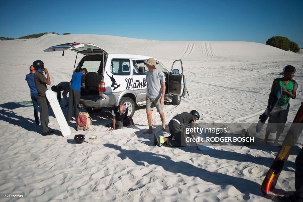 SAFRICA-CAPETOWN-SANDSURFING-FEATURE