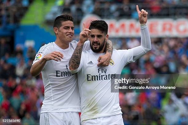 Francisco Roman Alarcon alias Isco of Real Madrid CF celebrates scoring their second goal with teammate James Rodriguez during the La Liga match...