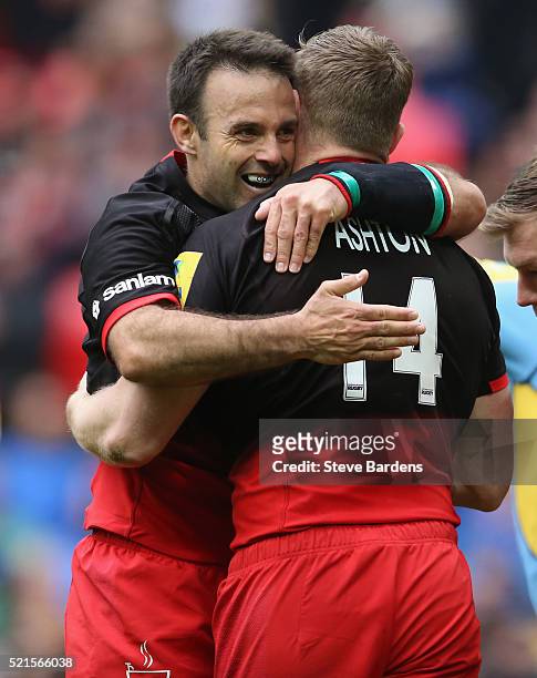 Chris Ashton of Saracens celebrates his 2nd try with Neil De Kock during the Aviva Premiership between Saracens and Harlequins at Wembley Stadium on...