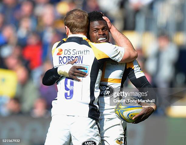 Christian Wade of Wasps celebrates scoring his fourth try of the match with Dan Robson during the Aviva Premiership match between Worcester Warriors...