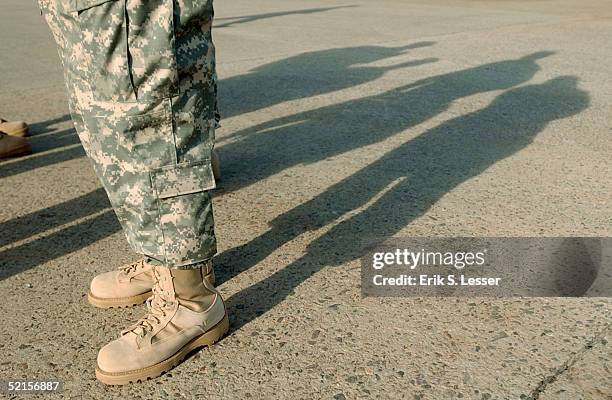 Soldier wears new combat boots, included in the U.S. Army's new Army Combat Uniform , February 8, 2005 at Fort Stewart, Georgia. The ACU includes a...