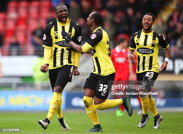 Clevid Dikamona of Dagenham & Redbridge celebrates scoring his side's second goal during the Sky Bet League Two match between Leyton Orient and...