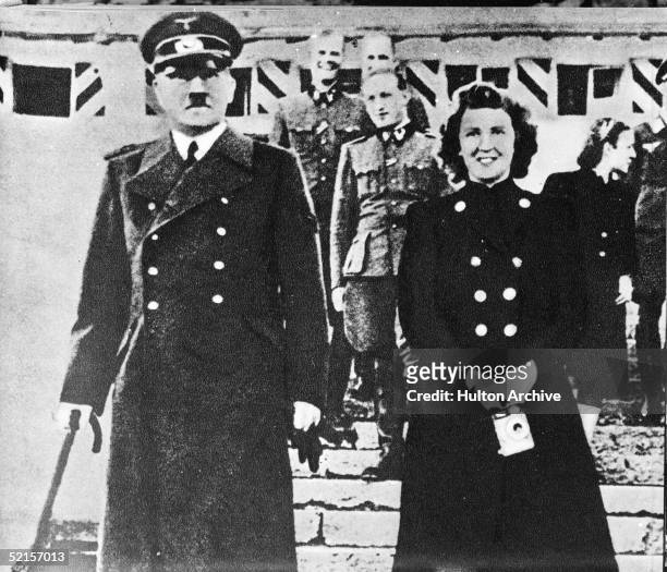 German dictator Adolf Hitler with his mistress Eva Braun , whom he married on April 29 the day before they committed suicide, early to mid 1940s....