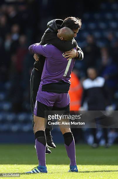 Quique Flores manager of Watford celebrates with Heurelho Gomes of Watford following his sides victory during the Barclays Premier League match...