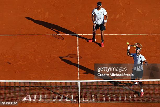 Juan Sebastian Cabal and Robert Farah of Colombia in action during the semi final match against Nicolas Mahut and Pierre-Hugues Herbert of France on...